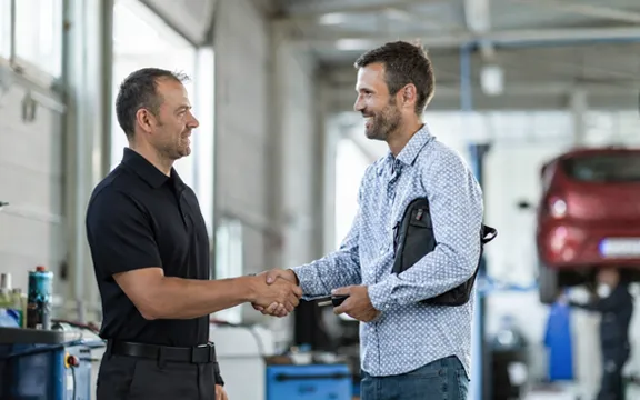 Technician with customer